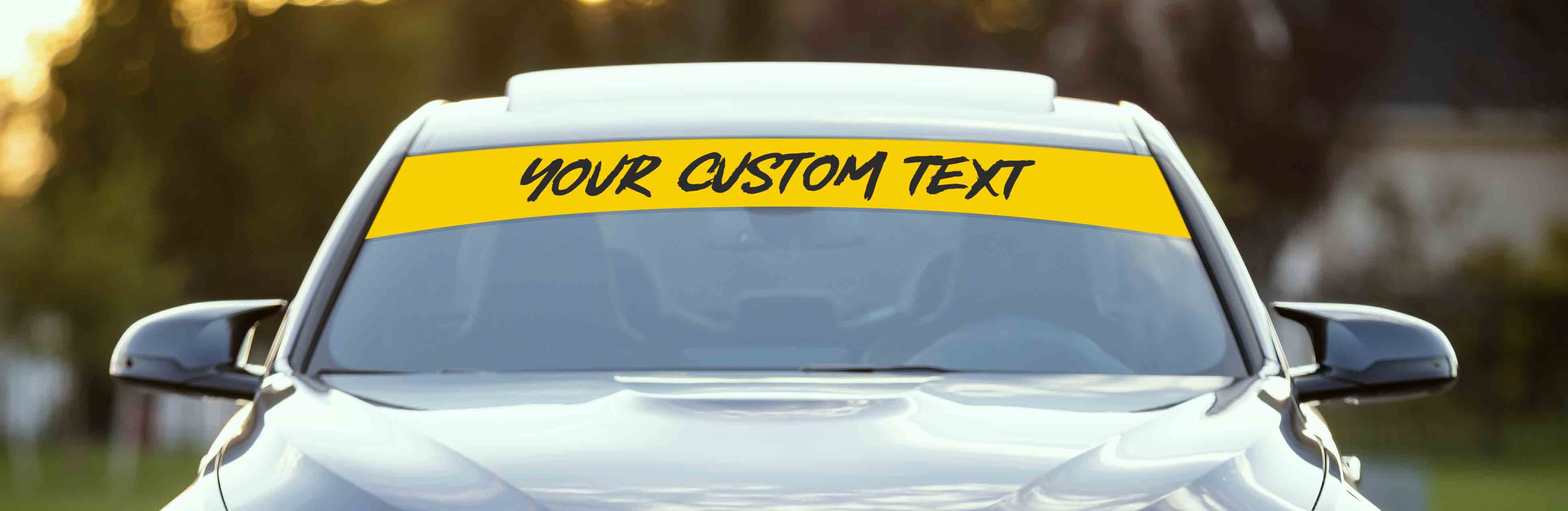 Personalized windshield sun strips with custom text