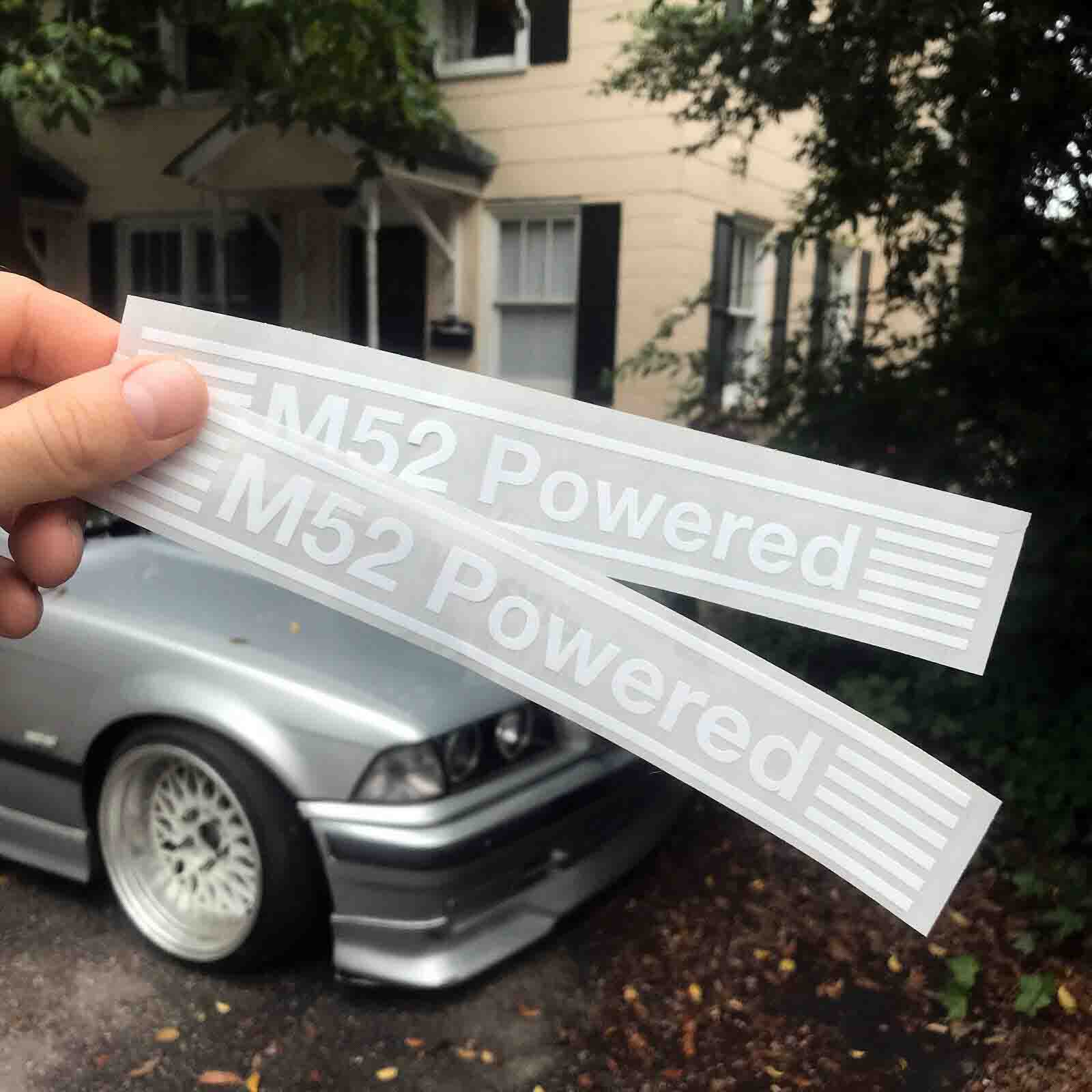 Two BMW Powered Window Stickers